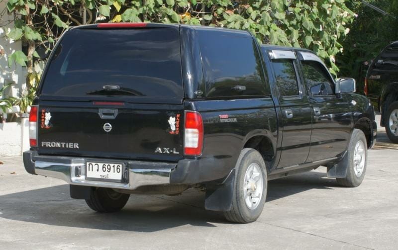 Nissan Navara D22 Workstyle Tradesman Canopy black with view from the back Canopies for